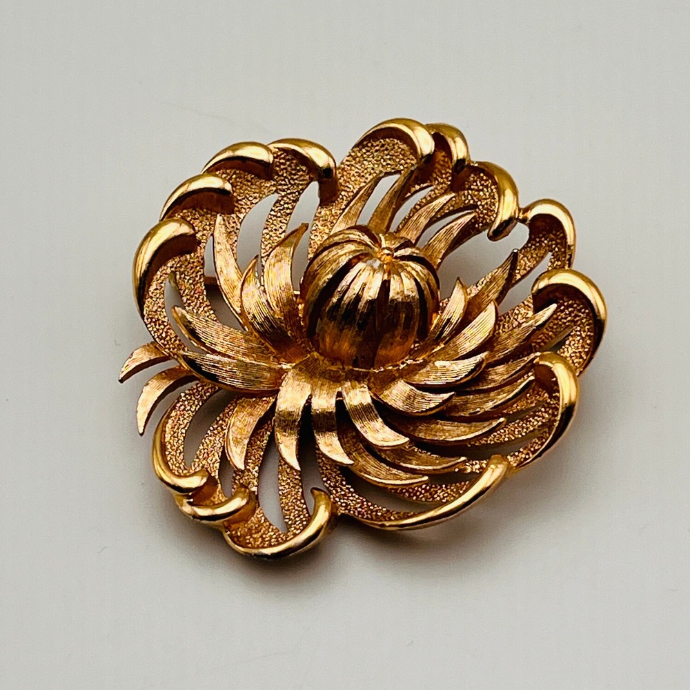 Monet Vintage Flower Brooch Textured Openwork Floral Gold Tone Swirl Pin